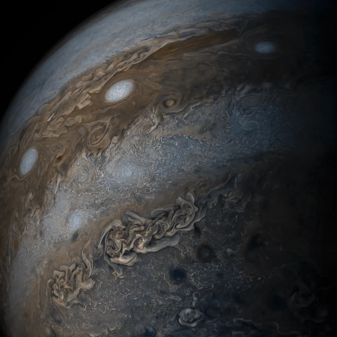 This enhanced-color image of Jupiter's bands of light and dark clouds was created by citizen scientists Gerald Eichstädt and Seán Doran using data from the JunoCam imager on NASA's Juno spacecraft.