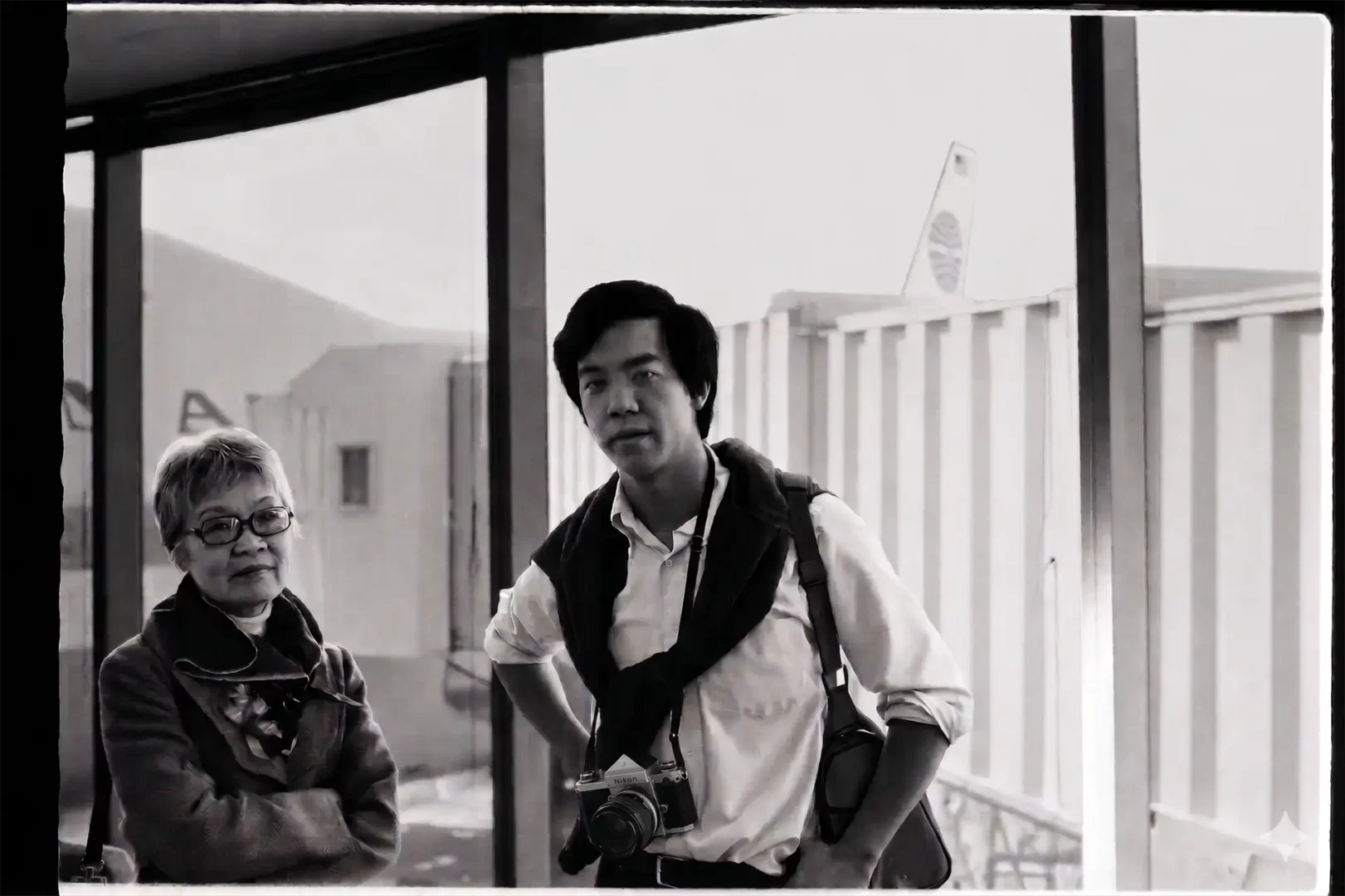 Sophia Wong and Leslie Wong at SFO, 1975, before departing for China.